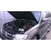 Амортизатор капота на Mitsubishi Pajero KU-MI-PJ04-00